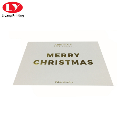 Feliz Navidad impresión de tarjetas de regalo con logo dorado.