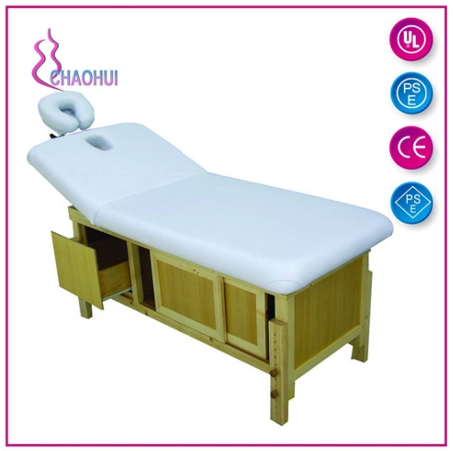 Wooden massage table with storage cabinet