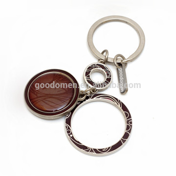 leather rugby metallic rotatable spinner keychain