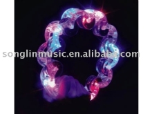 Plastic blinking tambourine
