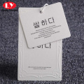 Etiqueta de relieve de papel para colgar ropa con cuerda