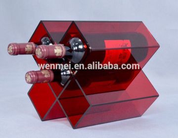 Semitransparent red acrylic wine bottle holder