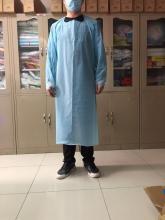 Waterproof disposable CPE isolation apron with thumb hole