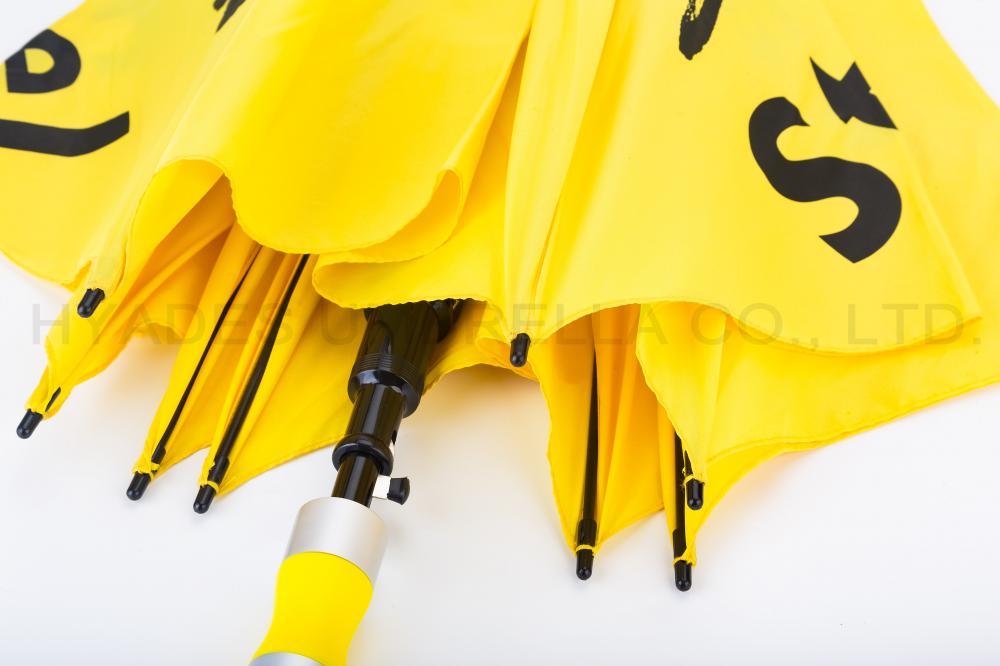 Yellow and red golf umbrella