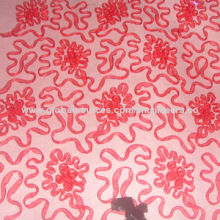 Cording device and ribbon device