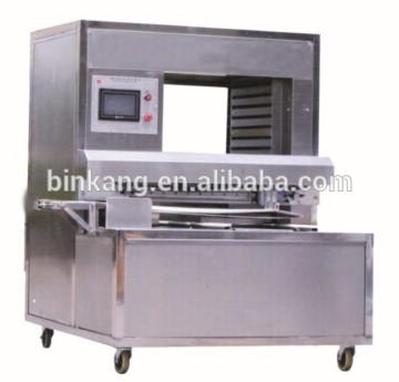 Automatic mooncake tray arranging machine