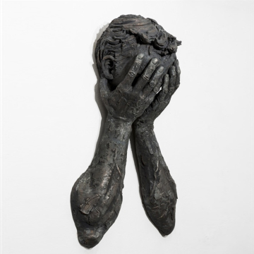 Abstract bronze Matteo Pugliese statue on wall sad sculpture