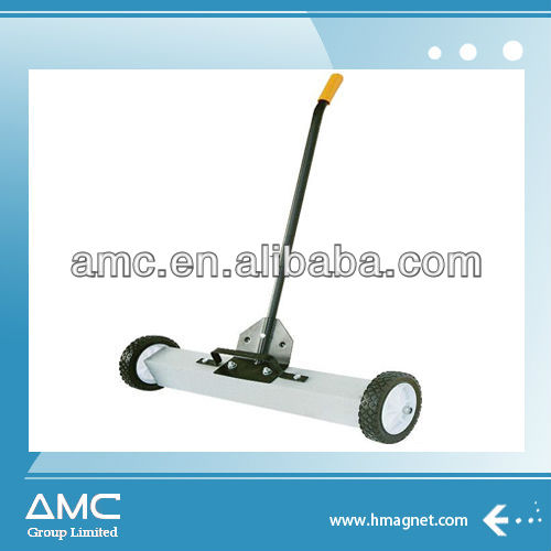 Magnetic sweeper with release