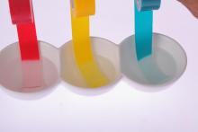 Temperature sensitive color changing tape