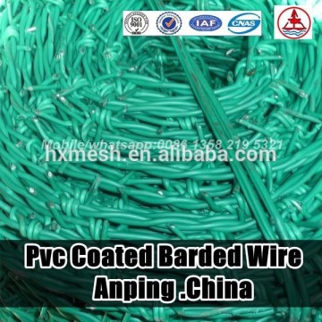 china factory PVC coated barbed wire coil