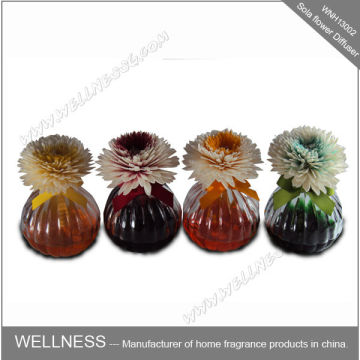 handmade sola flowers with colorful ceramic holder diffuser