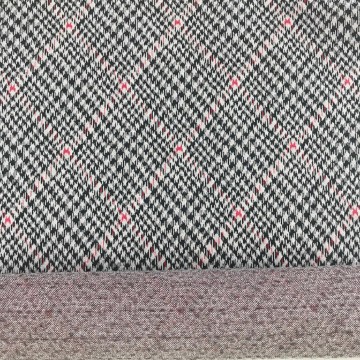 Jacquard lavorato a maglia con disegno pied de poule