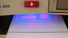 fluorescing red wax base bar code ribbon 106B