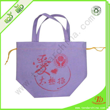 Charitable gift bag, made of non woven fabric with drawstring closure
