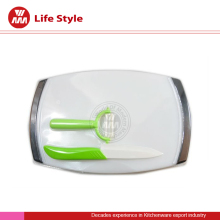 Green kitchen knives set with cutting board