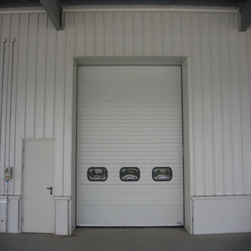 Fast action industry high speed sectional door