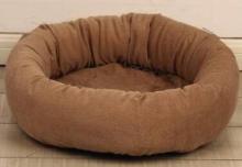A brown round pet beds