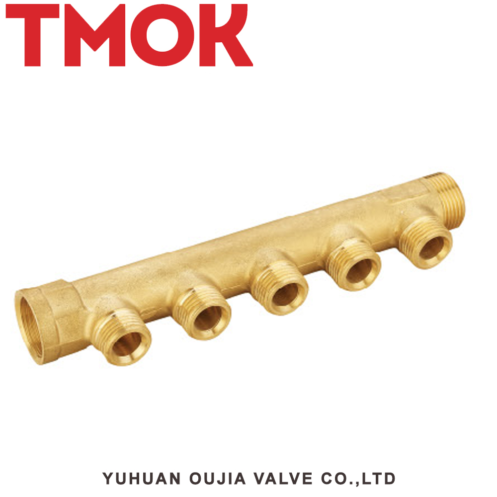 brass color four-way water manifold