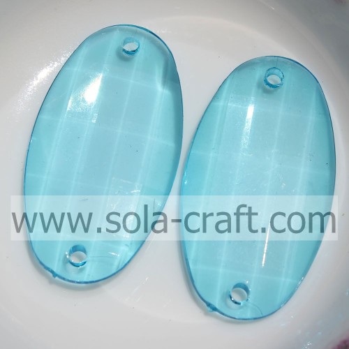 Perline ovali in plastica trasparente con due fori per collegamenti di pareti, finestre e porte