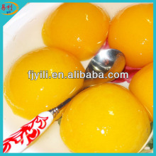 Canned yellow peach halves in light syrups