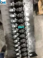 Rantai konveyor untuk memproduksi sarung tangan nitril
