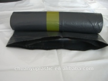 black plastic garbage bag on roll
