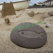 Carved fish stone rune stone