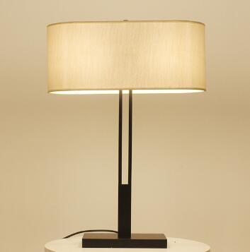 White linen metal base hotel bedside table lamp