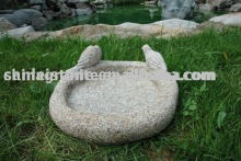 stone carving birdbath