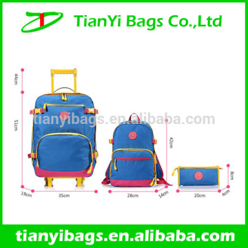 Young girl bags girl trolley school bag