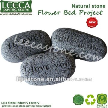 Engraved cobblestone river stone with words