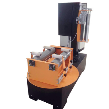 roll wrapping machine for packing rolls