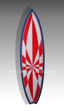 Red hypnotic design fiberglass retro surfboard
