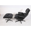 Melns saplāksnis Eames Lounge Chair un Ottoman