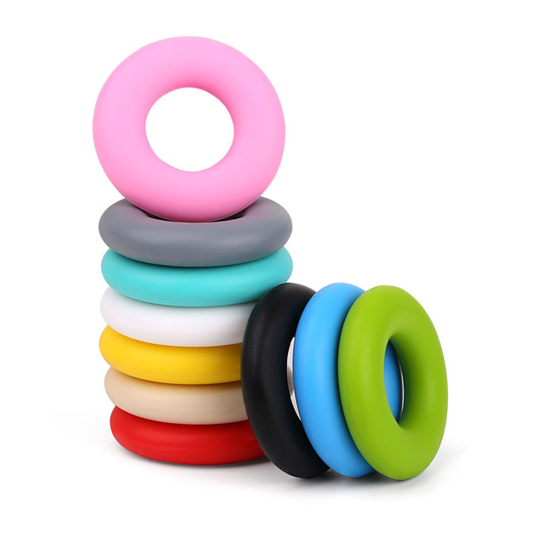 Bpa Free Custom Wholesale Food Grade Soft Baby Teething Toy Ring Teether Donut Silicone Beads