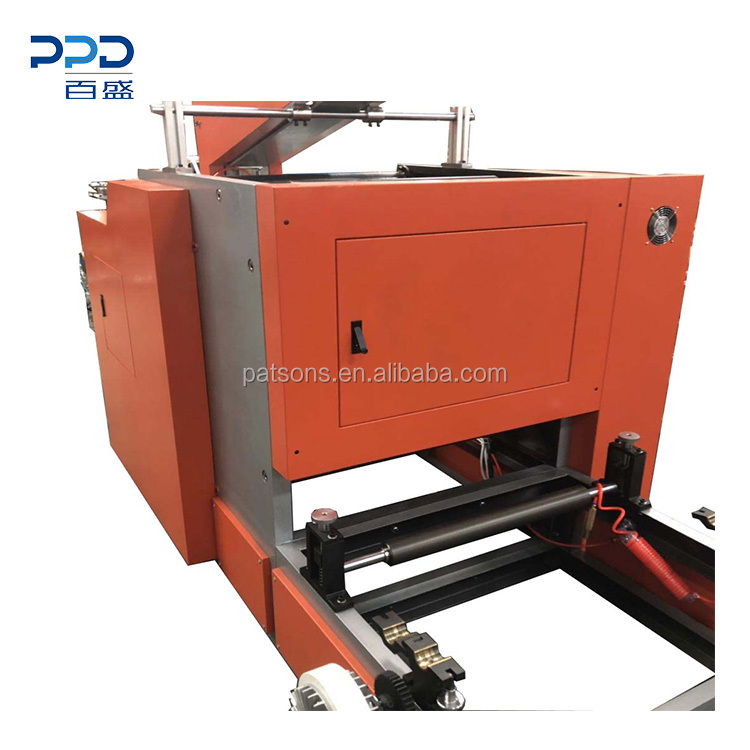 High production automatic bakery paper rewinder machine with automatic sticker