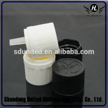 child-resistant plastic cap with inner dropper