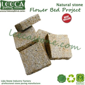 Bush hammered yellow granite paver stone