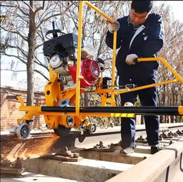Rail switch grinding machine for track maintenance