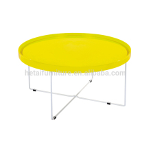 Modern small round coffee tables in wood