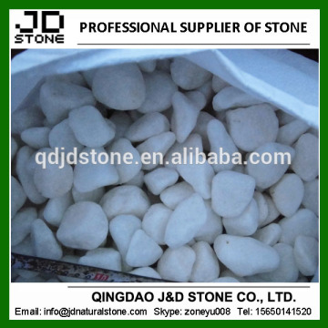 white pebbles paving stone