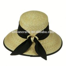 straw hat and bag with butterfly trim