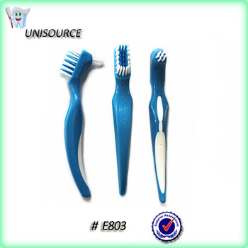 Plastic hard bristle denture brush