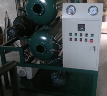 Double-stage vacuum transformer oil purifier