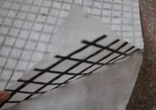 Bitumen Coated Fiberglass Geogrid with nonwoven geotextile