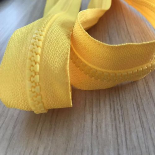 Promotional yellow plastic separating coat zippers