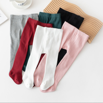 Wholesale Newborn Baby Girl Solid Color Tights in Black, White, and Pink for Autumn