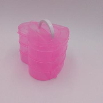 boîte de rangement en plastique rose en forme de cœur