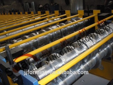 Double trapezoidal roofing roll making machine