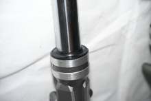 Inner spring knife shock absorber